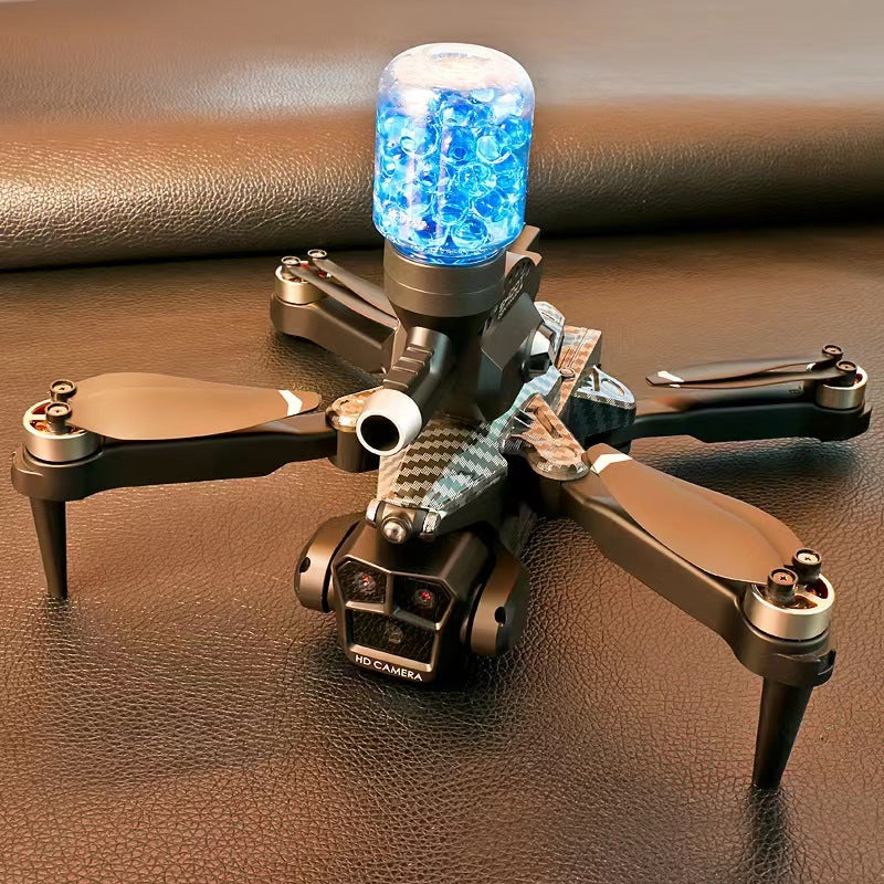 Small black drone with blue light on top, resting on a leather surface.